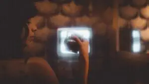 A Man Holding A Camera